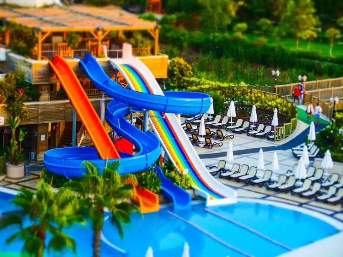A swimming pool with slides